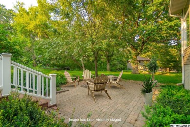 Nestled on over an acre on a scenic private drive, this on Highland Park Golf Course in Iowa - for sale on GolfHomes.com, golf home, golf lot