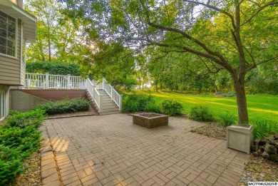 Nestled on over an acre on a scenic private drive, this on Highland Park Golf Course in Iowa - for sale on GolfHomes.com, golf home, golf lot