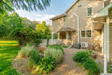 Nestled on over an acre on a scenic private drive, this on Highland Park Golf Course in Iowa - for sale on GolfHomes.com, golf home, golf lot