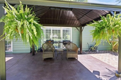 Impeccably updated 3-bedroom, 2-bath home overlooking the 13th on Rose Hill Golf Club in South Carolina - for sale on GolfHomes.com, golf home, golf lot