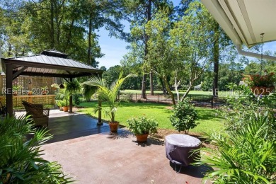 Impeccably updated 3-bedroom, 2-bath home overlooking the 13th on Rose Hill Golf Club in South Carolina - for sale on GolfHomes.com, golf home, golf lot