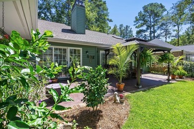 Impeccably updated 3-bedroom, 2-bath home overlooking the 13th on Rose Hill Golf Club in South Carolina - for sale on GolfHomes.com, golf home, golf lot