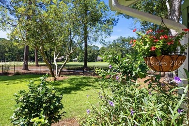 Impeccably updated 3-bedroom, 2-bath home overlooking the 13th on Rose Hill Golf Club in South Carolina - for sale on GolfHomes.com, golf home, golf lot