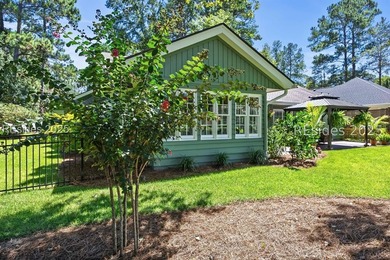 Impeccably updated 3-bedroom, 2-bath home overlooking the 13th on Rose Hill Golf Club in South Carolina - for sale on GolfHomes.com, golf home, golf lot