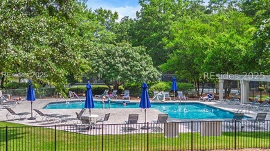 Impeccably updated 3-bedroom, 2-bath home overlooking the 13th on Rose Hill Golf Club in South Carolina - for sale on GolfHomes.com, golf home, golf lot