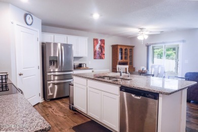 Kitchen boasts spacious cabinetry and Stainless Whirlpool range on Millstone Golf Club in Tennessee - for sale on GolfHomes.com, golf home, golf lot