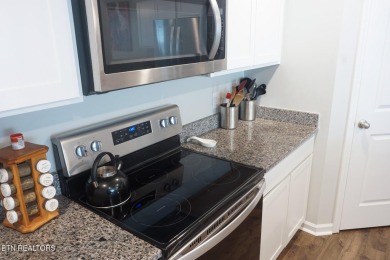 Kitchen boasts spacious cabinetry and Stainless Whirlpool range on Millstone Golf Club in Tennessee - for sale on GolfHomes.com, golf home, golf lot