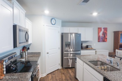 Kitchen boasts spacious cabinetry and Stainless Whirlpool range on Millstone Golf Club in Tennessee - for sale on GolfHomes.com, golf home, golf lot