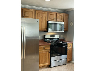 Spacious Cape with 3 bedrooms, 2.5 baths, and an inviting on Falmouth Country Club and Golf Courses in Massachusetts - for sale on GolfHomes.com, golf home, golf lot