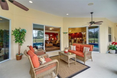 Luxury Living with Golf Course Views and Heated Saltwater Pool! on Harbor Hills Country Club in Florida - for sale on GolfHomes.com, golf home, golf lot