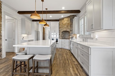 Stunning lakefront retreat in Cuscowilla on Lake Oconee on The Golf Club at Cuscowilla in Georgia - for sale on GolfHomes.com, golf home, golf lot