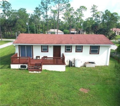 Welcome to this charming 3-bedroom, 2-bath Naples home tucked on The Club At Twin Eagles in Florida - for sale on GolfHomes.com, golf home, golf lot