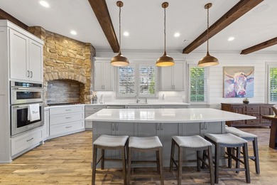 Stunning lakefront retreat in Cuscowilla on Lake Oconee on The Golf Club at Cuscowilla in Georgia - for sale on GolfHomes.com, golf home, golf lot