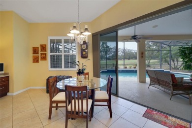 Luxury Living with Golf Course Views and Heated Saltwater Pool! on Harbor Hills Country Club in Florida - for sale on GolfHomes.com, golf home, golf lot