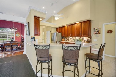 Luxury Living with Golf Course Views and Heated Saltwater Pool! on Harbor Hills Country Club in Florida - for sale on GolfHomes.com, golf home, golf lot