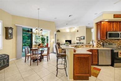 Luxury Living with Golf Course Views and Heated Saltwater Pool! on Harbor Hills Country Club in Florida - for sale on GolfHomes.com, golf home, golf lot