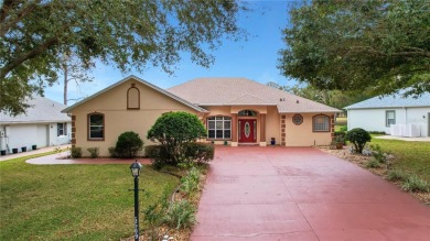 Luxury Living with Golf Course Views and Heated Saltwater Pool! on Harbor Hills Country Club in Florida - for sale on GolfHomes.com, golf home, golf lot