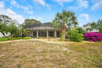 Luxury Living with Golf Course Views and Heated Saltwater Pool! on Harbor Hills Country Club in Florida - for sale on GolfHomes.com, golf home, golf lot