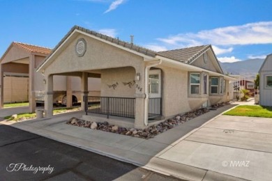Discover the perfect blend of comfort and convenience in this on Beaver Dam Resort in Arizona - for sale on GolfHomes.com, golf home, golf lot