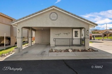 Discover the perfect blend of comfort and convenience in this on Beaver Dam Resort in Arizona - for sale on GolfHomes.com, golf home, golf lot