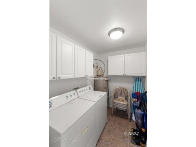 Discover the perfect blend of comfort and convenience in this on Beaver Dam Resort in Arizona - for sale on GolfHomes.com, golf home, golf lot