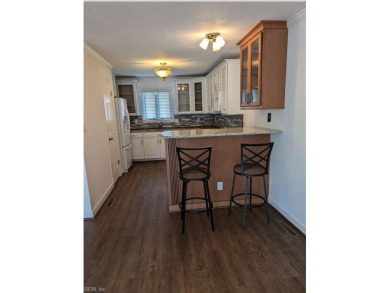 This charming condo is located on the 14th Fairway with on Cypress Point Country Club in Virginia - for sale on GolfHomes.com, golf home, golf lot