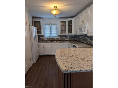 This charming condo is located on the 14th Fairway with on Cypress Point Country Club in Virginia - for sale on GolfHomes.com, golf home, golf lot