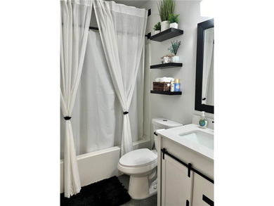 Welcome to this beautifully renovated townhome! You don't want on Collins Hill Golf Club in Georgia - for sale on GolfHomes.com, golf home, golf lot