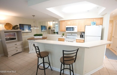 Welcome to this meticulously maintained 2-bedroom, 2-bath condo on Brunswick Plantation and Golf Resorts in North Carolina - for sale on GolfHomes.com, golf home, golf lot