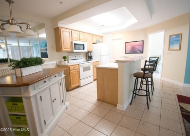 Welcome to this meticulously maintained 2-bedroom, 2-bath condo on Brunswick Plantation and Golf Resorts in North Carolina - for sale on GolfHomes.com, golf home, golf lot