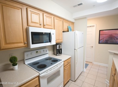 Welcome to this meticulously maintained 2-bedroom, 2-bath condo on Brunswick Plantation and Golf Resorts in North Carolina - for sale on GolfHomes.com, golf home, golf lot