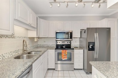 Appealing two bedroom, two bath, end unit villa, with attached on Sawgrass Golf Club in Florida - for sale on GolfHomes.com, golf home, golf lot