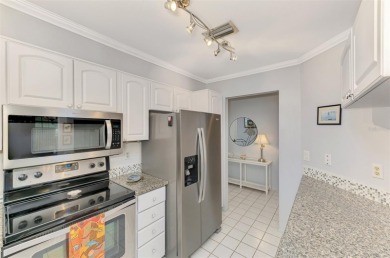 Appealing two bedroom, two bath, end unit villa, with attached on Sawgrass Golf Club in Florida - for sale on GolfHomes.com, golf home, golf lot