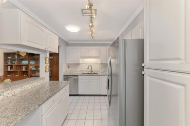 Appealing two bedroom, two bath, end unit villa, with attached on Sawgrass Golf Club in Florida - for sale on GolfHomes.com, golf home, golf lot
