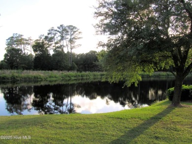 Welcome to this meticulously maintained 2-bedroom, 2-bath condo on Brunswick Plantation and Golf Resorts in North Carolina - for sale on GolfHomes.com, golf home, golf lot