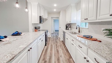 Live your best life in one of East Texas' most coveted gated on Hide-A-Way Lake Golf Course in Texas - for sale on GolfHomes.com, golf home, golf lot