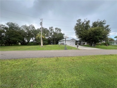 This beautiful Corner Lot is located in a lovely, established & on Del Tura Golf and Country Club in Florida - for sale on GolfHomes.com, golf home, golf lot
