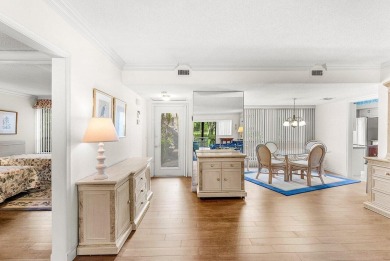 Experience relaxed living in this beautifully appointed on Quail Ridge Golf Course and Country Club in Florida - for sale on GolfHomes.com, golf home, golf lot
