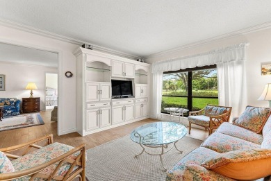 Experience relaxed living in this beautifully appointed on Quail Ridge Golf Course and Country Club in Florida - for sale on GolfHomes.com, golf home, golf lot