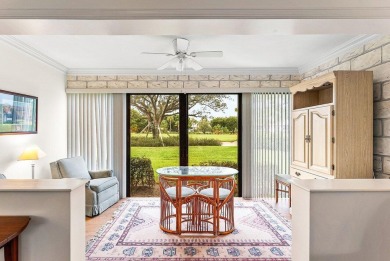 Experience relaxed living in this beautifully appointed on Quail Ridge Golf Course and Country Club in Florida - for sale on GolfHomes.com, golf home, golf lot