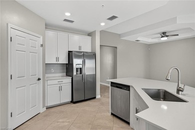 Experience serene resort-style living in this beautifully on Gateway Golf and Country Club in Florida - for sale on GolfHomes.com, golf home, golf lot