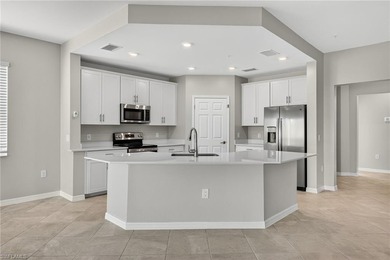 Experience serene resort-style living in this beautifully on Gateway Golf and Country Club in Florida - for sale on GolfHomes.com, golf home, golf lot