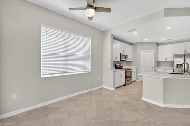 Experience serene resort-style living in this beautifully on Gateway Golf and Country Club in Florida - for sale on GolfHomes.com, golf home, golf lot