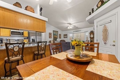 Pride of ownership truly shines in this beautifully maintained on Beaver Dam Resort in Arizona - for sale on GolfHomes.com, golf home, golf lot