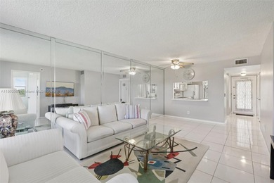 Welcome to this quiet, end unit on the 4th floor with on Sunrise Lakes Phase IV Golf Course in Florida - for sale on GolfHomes.com, golf home, golf lot