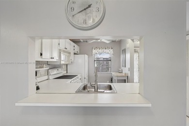 Welcome to this quiet, end unit on the 4th floor with on Sunrise Lakes Phase IV Golf Course in Florida - for sale on GolfHomes.com, golf home, golf lot