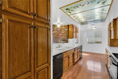 Beautifully positioned on the golf course within a prestigious on Canyon Lake Country Club in California - for sale on GolfHomes.com, golf home, golf lot