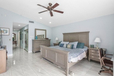 Located in the highly sought-after Boca Woods Country Club, this on Boca Woods Country Club in Florida - for sale on GolfHomes.com, golf home, golf lot