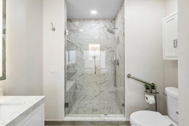 Located in the highly sought-after Boca Woods Country Club, this on Boca Woods Country Club in Florida - for sale on GolfHomes.com, golf home, golf lot
