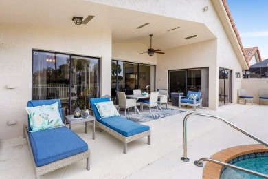 Located in the highly sought-after Boca Woods Country Club, this on Boca Woods Country Club in Florida - for sale on GolfHomes.com, golf home, golf lot